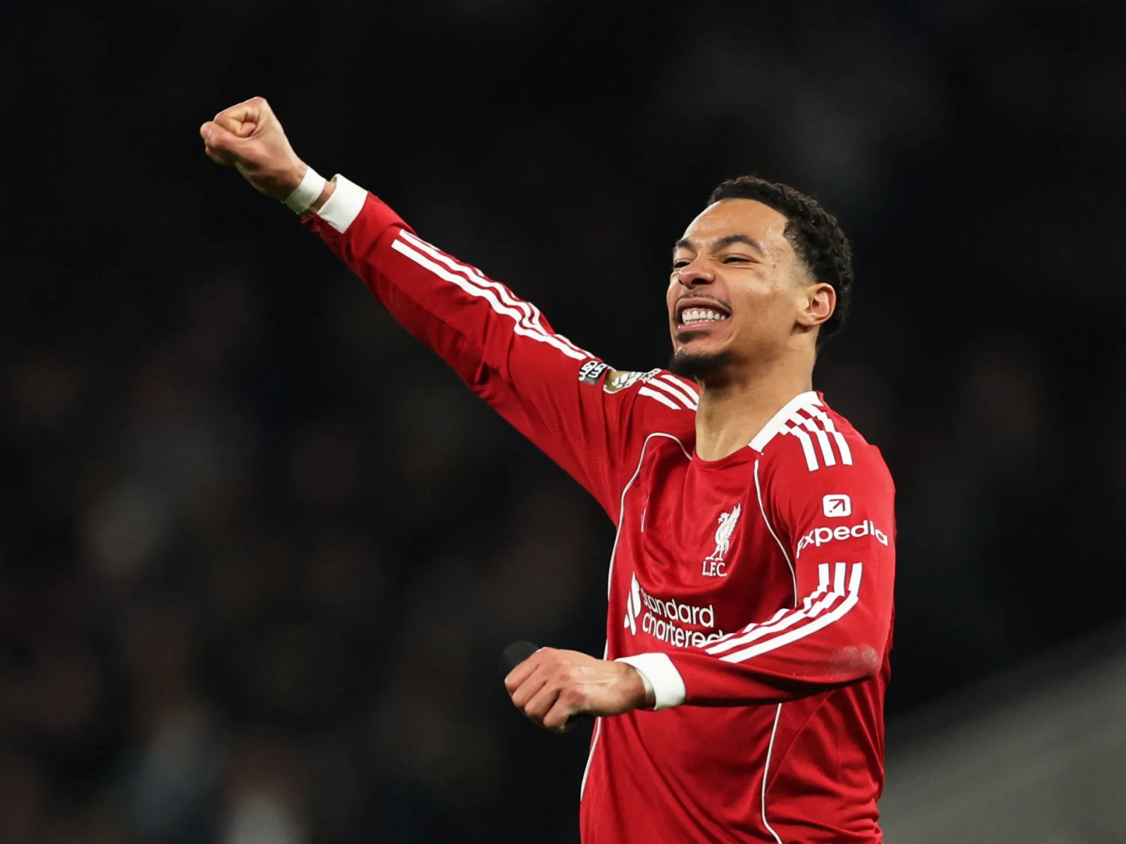 Ekitike and Isak Propel Liverpool to Victory Over Tottenham's Nine Men