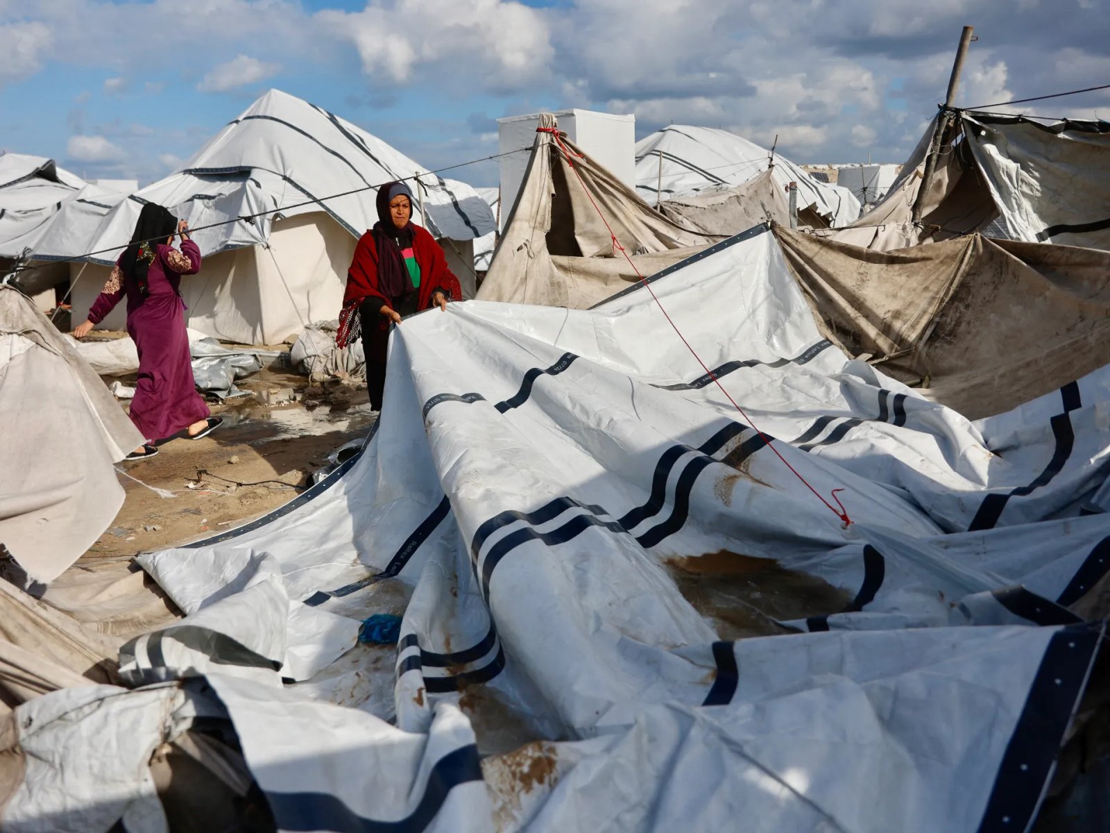 Gaza Storm Claims Life of Palestinian Woman Amidst Israeli Aid Restrictions Deepening Hardship