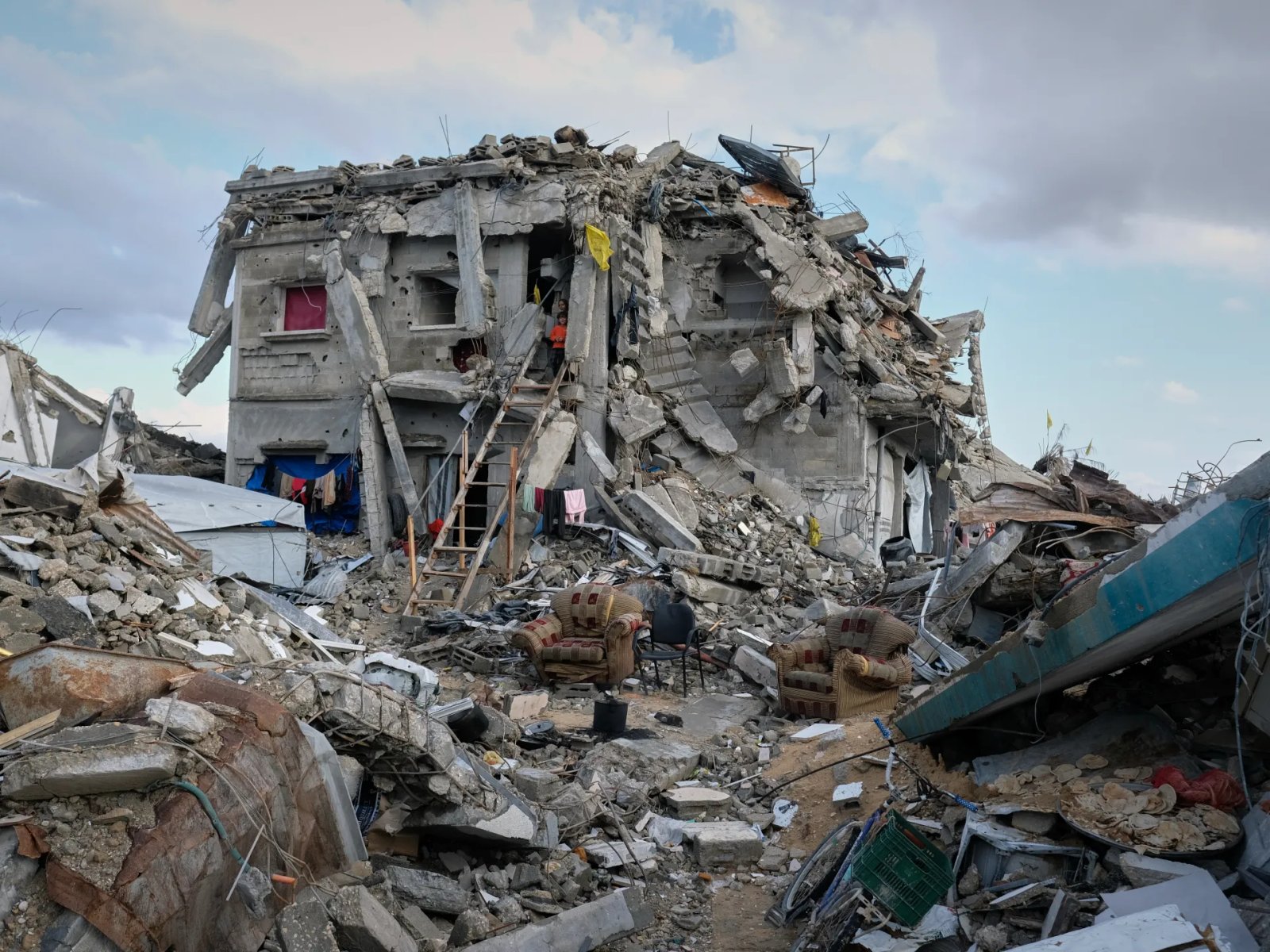 Israeli Airstrikes Transform Bombed Gaza Buildings into Shelters for Palestinians