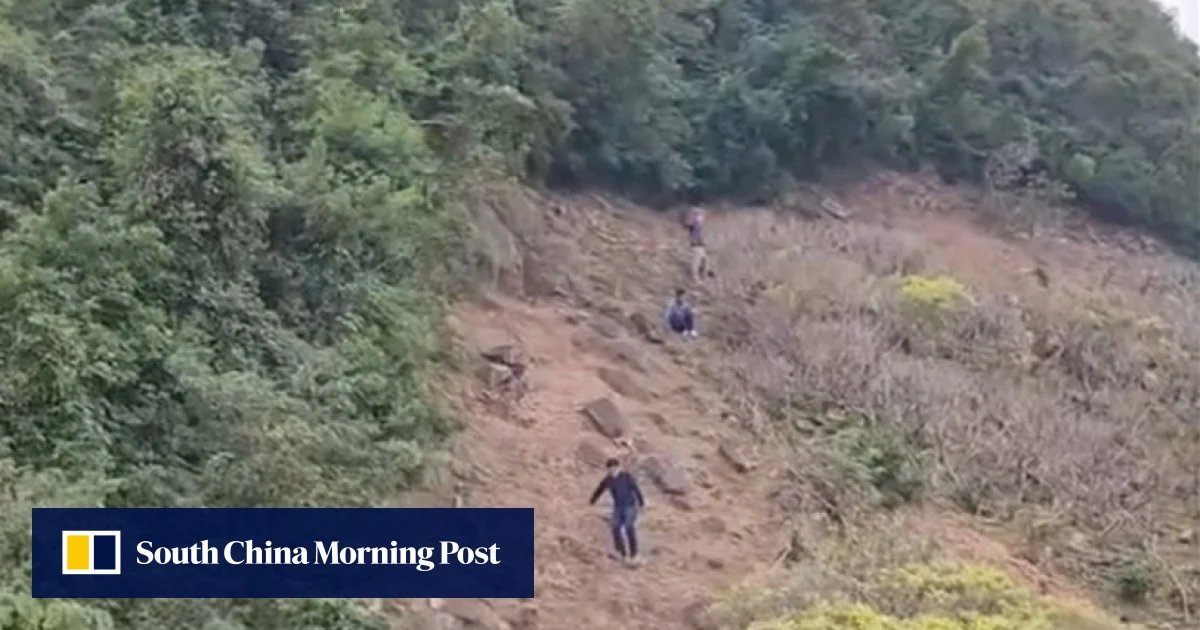 Video of three hikers climbing a slope at Ocean Park in Hong Kong becomes a sensation online.