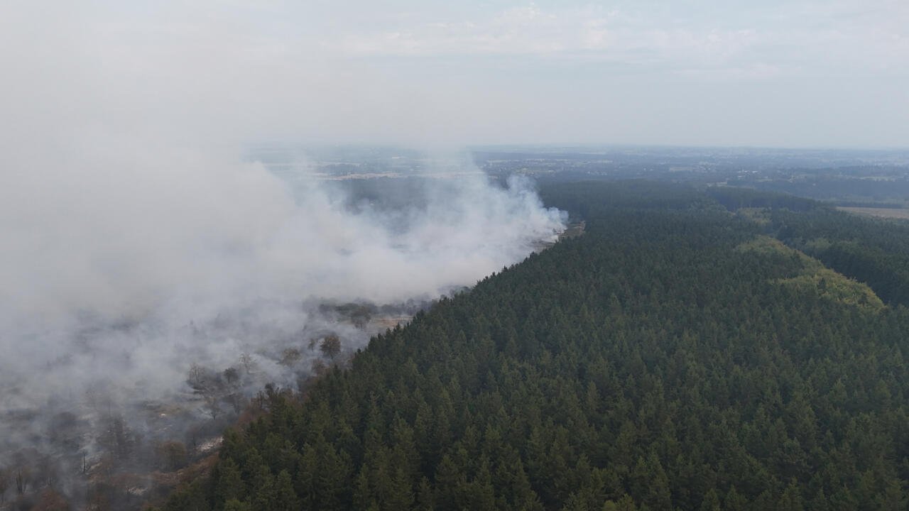 Belgium Faces Unprecedented Wildfire: EU Deploys Aircraft While Villagers Evacuate