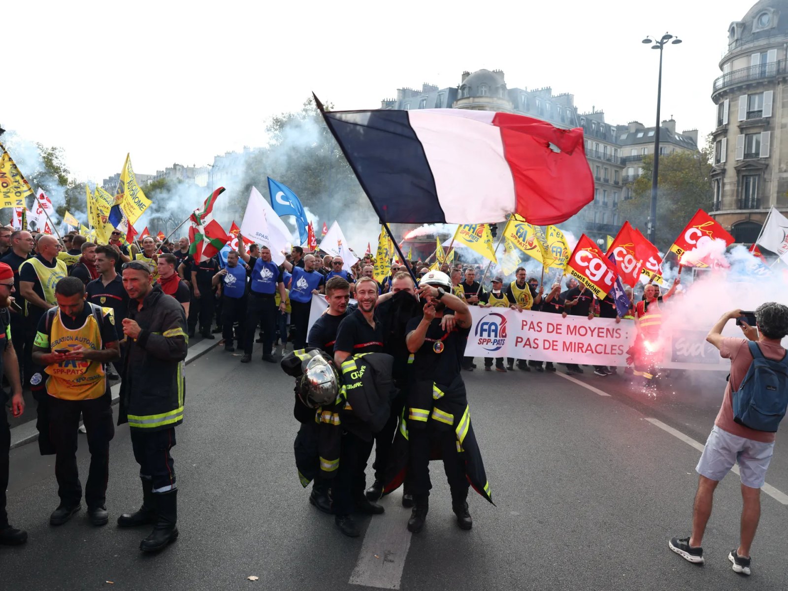 Images: French Students Demonstrate as Public Workers Strike Ahead of Budget Cuts