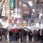 Millions urged to leave as strong Typhoon Dujuan strikes Japan.